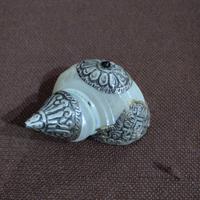 conchiglia con inserti di argento indiano 