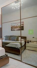 Armadio wenge a 3 ante con vetri fumè