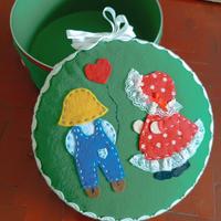 Scatola portaoggetti con bimbo e bimba