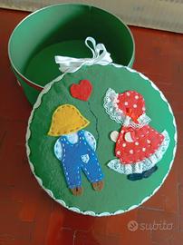 Scatola portaoggetti con bimbo e bimba