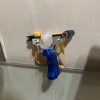 Fionda con mirino laser