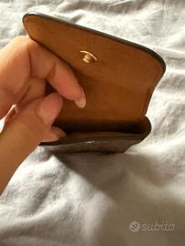 Porta airpords coach