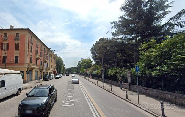 Bilocale con balcone, giardino e box auto