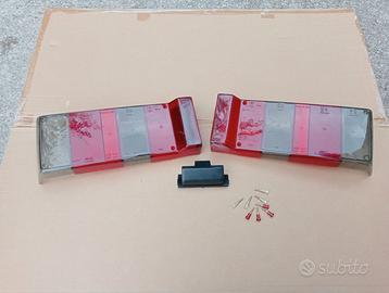 Plastiche fanali posteriori dx + sx Lancia Y 10
