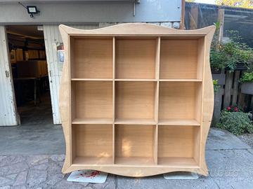 libreria a giorno sospesa grezza con cornice