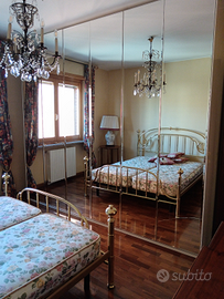 Camera da letto in ottone