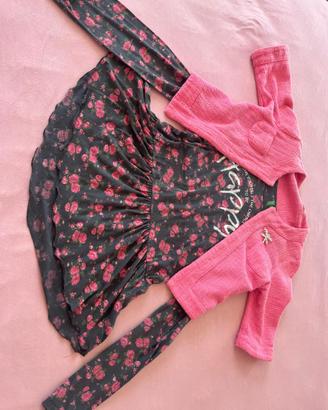 una maglietta lunga con un copri spalle