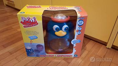 Pinguino Lampadino proiettore luci e suoni