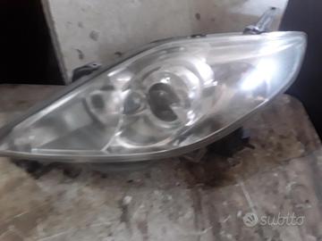 FARO ANTERIORE SX ALLO XENO MAZDA 5 Berlina (05>)