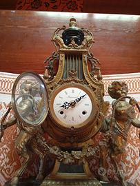 orologio e candelabri stile neoclassico 