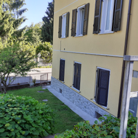 Trilocale vista Grigna con giardino e box
