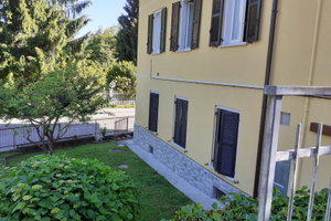 Trilocale vista Grigna con giardino e box