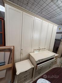 Camera da letto decapè