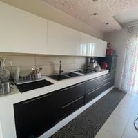 Cucina alta falegnameria con top in okite