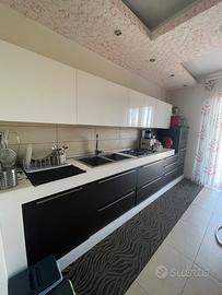 Cucina alta falegnameria con top in okite