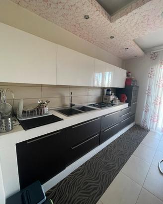 Cucina alta falegnameria con top in okite
