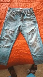 jeans uomo strappati 