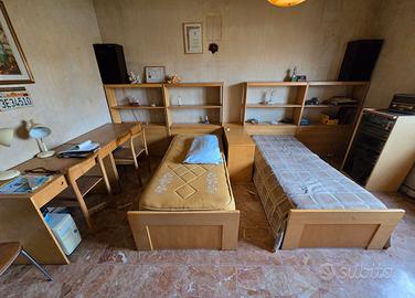 letti singoli da cameretta con libreria