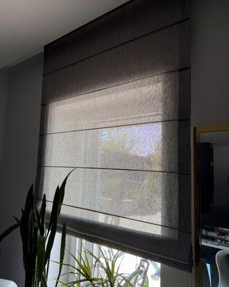 Tende a pacchetto color grigio.