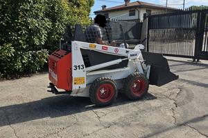 P180-Mini Pala Bobcat 313