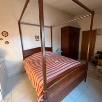 Letto a baldacchino