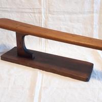 Antico stiramaniche in legno
