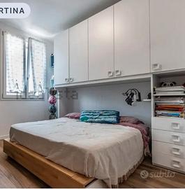 armadio a ponte con letto matrimoniale