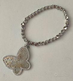 Bracciale argentato con ciondolo farfalla e strass
