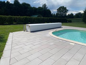 Copertura a tapparella per piscina interrata