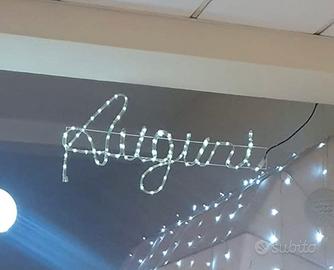 Insegna  auguri luminosa