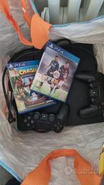 Ps4 pro 1 tb + 2 controller+ 2 giochi