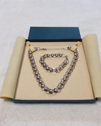 Parure acciaio anelli collana + bracciale 