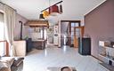 villa-a-schiera-di-testa-con-giardino-e-box-