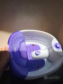 Caldi pediluvio, massaggio, bolle.