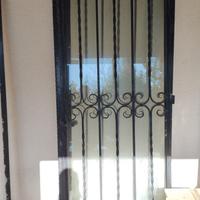 Porta ingresso in ferro e vetro