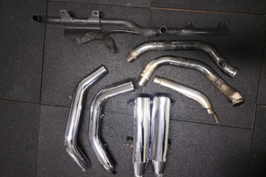 Staffa compensatore sostegno scarico Harley Davids