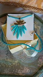 Collana di Pietre turchese con cordoncino.
