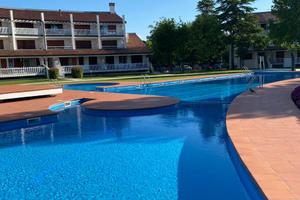 Appartamento a Caorle con piscina e giardino
