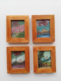 Piccoli quadri con cornici in legno 