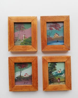 Piccoli quadri con cornici in legno 