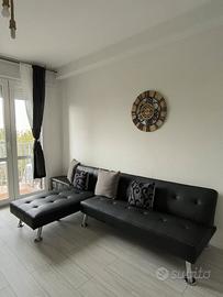 Divano letto in ecopelle nero