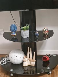 porta tv munito di 4 ruote piroettanti, 