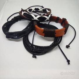 Lotto di 4 bracciali in cuoio e corda