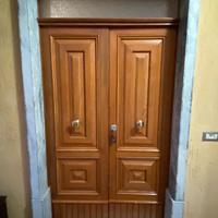 Marmo e Portone in legno massello