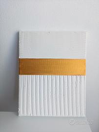 Quadro materico bianco e oro