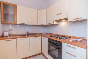 Trilocale con veranda a pochi passi dal centro