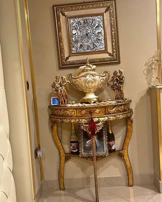 Consolle in foglia oro con Orologio