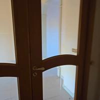 Porta interna a due ante 