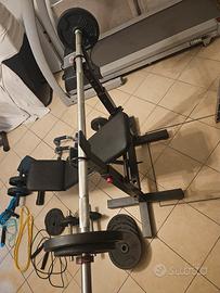 Panca con rack + pesi 