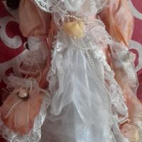 Bambola da collezione in porcellana